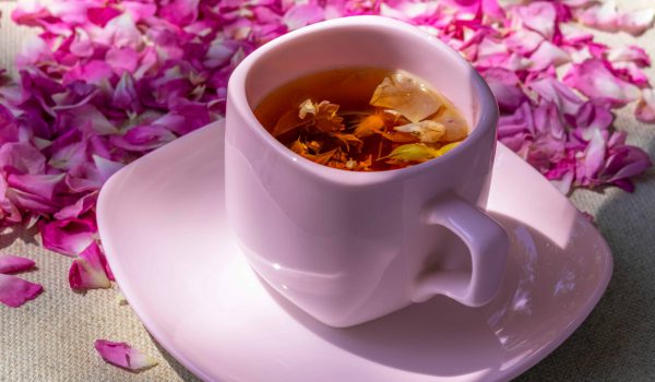 Tea,From,Rose,Petals.,In,Pink,Cup,,On,Pink,Background